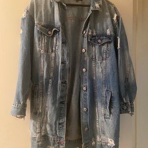 Long, distressed jean jacket